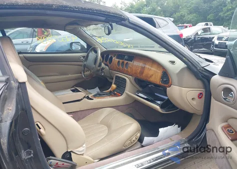 1999 Jaguar Xk8 из США, поврежденный, VIN SAJGX2042XC040972